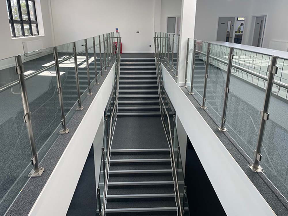 Office stairs and glass partitions